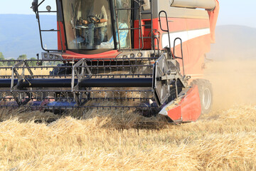 Fototapeta na wymiar Image of combine harvester harvesting wheat.