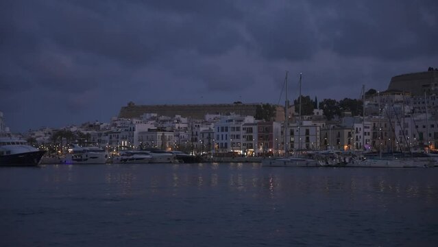 Harbour boats and Cathedral above Dalt Vila old town at dusk, UNESCO World Heritage Site, Ibiza Town, Ibiza, Balearic Islands, Spain