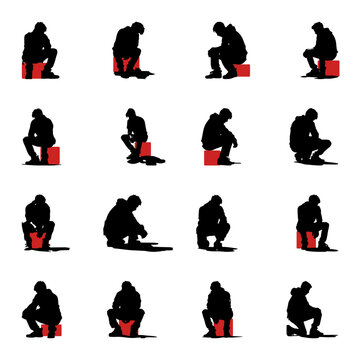 silhouette of sitting man looking down sad, depressed, regret