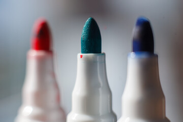 Red green and blue white board markers