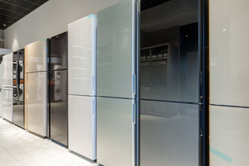 Rows of fridges in household appliance store