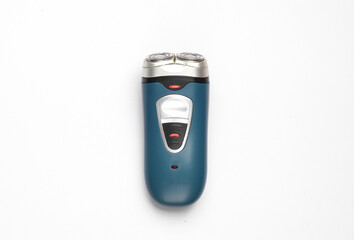 Electric razor on a gray background