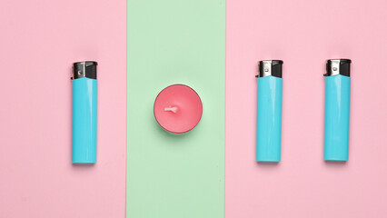 Aroma tea candle with lighters on a pink blue pastel background. Top view - obrazy, fototapety, plakaty