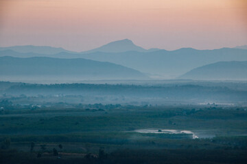 Obraz premium sunrise over the mountains, Bueng Kan