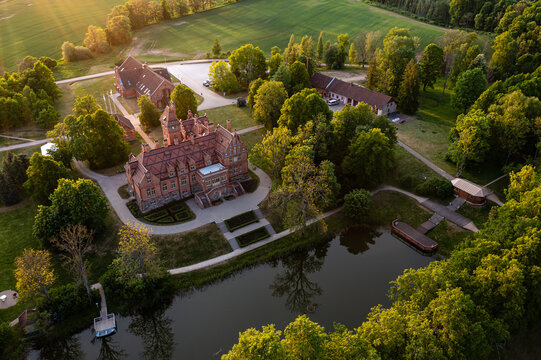Jaunmoku brick medieval castle and its territory near Tukums, Latvia, drone view