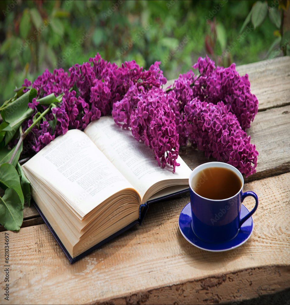 Wall mural still life from ancient book and lush boquet