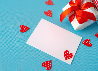 Empty White Gift Card for Congratulation, Love Hearts Stickers, Gift Box with Ribbon, Blue Table, a template for designer, using Generative Ai technologie
