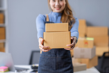 Portrait of Starting small businesses SME owners female entrepreneurs working on receipt box and...