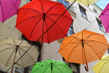 Yellow and blue umbrellas against the sky © Viktoriia Pletska
