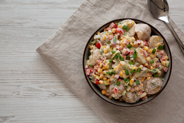 Homemade Summer Potato Salad in a Bowl, top view. Flat lay, overhead, from above.