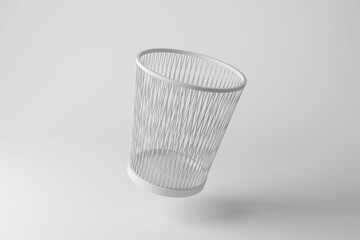 White mesh bin floating in mid air on white background in monochrome and minimalism. Illustration of waste and rubbish in office - obrazy, fototapety, plakaty