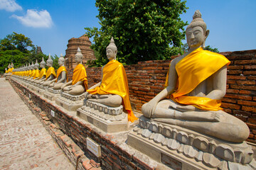 Buddha statues in a row in Ayutthaya, Thailand