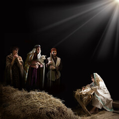 Shepherds with a lamb came to worship the newborn Jesus