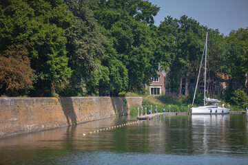 Fototapeta premium Netherlands, Holland, Amsterdam, Rokin, Zaanse, Schans, Monnickendam, Muiden, Muiderslot, Rotterdam, Jiburg, Hoorn, kasteel De Haar, fort Uitermeer, Naarden, Zunderdorp, Begijnhof, Zeedijk, travel
