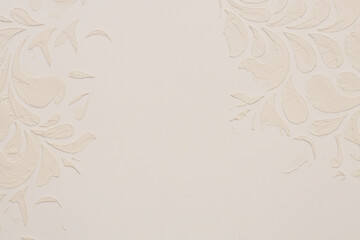 Abstract beige and white color acrylic relief stucco wall painting. Canvas modeling clay texture background.