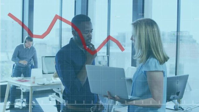 Animation of red grah moving against diverse man and woman discussing over a laptop at office