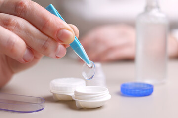 Contact lenses for vision correction in hands 