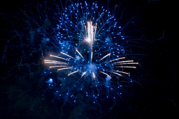 Beautiful blue firework at night. Selective focus. 