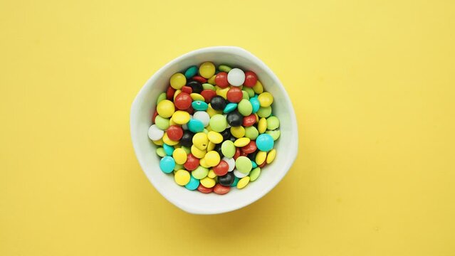 multi-colored sweet candies in a bowl 
