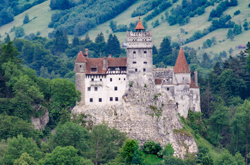 Naklejka premium Medieval Bran Castle also known as Dracula Castle built to guard the mountain pass between Transylvania and Wallachia in Bran, Brasov, Romania
