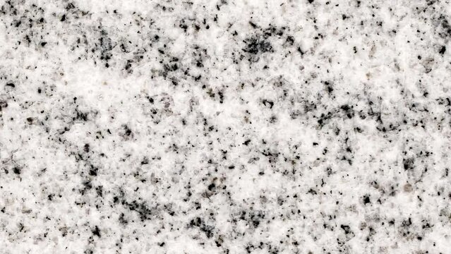 Background marble crumb surface, uniform texture, rotating, turning, close-up, looped video
