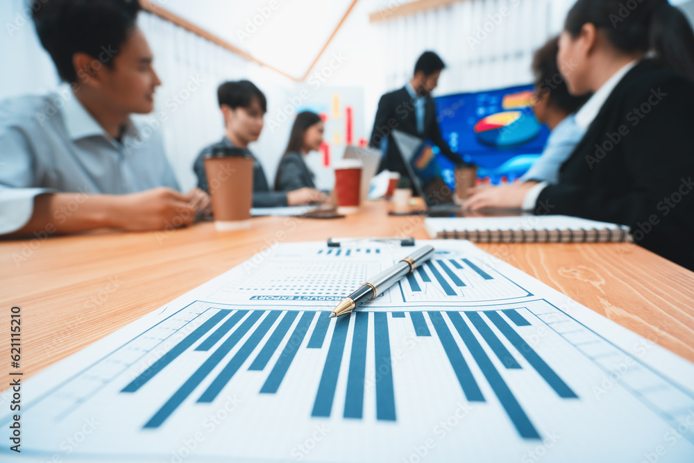 Aufkleber focus financial dashboard paper showing graphs and chart with blurred background of diverse business