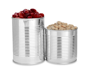 Tin cans with different kidney beans on white background