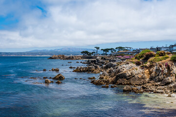 View of the Monterey coastline. Ocean View Boulevard in Pacific Grove, California