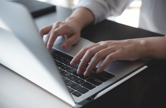 Close Up, Woman Hands Typing On Laptop Computer Keyboard, Surfing The Internet On Office Table, Online, Working, Business And Technology, Internet Network Communication Concept