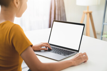 Woman hand working on laptop with blank copy space screen, mock-up for the application.