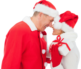 Digital png photo of happy caucasian couple in santa's hat holding gift on transparent background