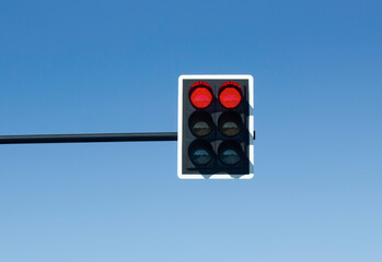 led traffic light on blue background