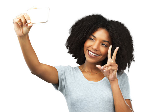 Happy, peace and a black woman with a selfie for social media, fun and smile. Online, young and an African girl taking a photo for the web with an emoji sign isolated on a transparent png background