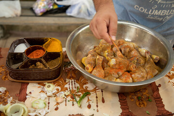 adding chilli to the chicken