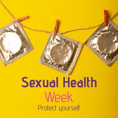Sexual health week, protect yourself text, with condoms pegged to line on yellow background