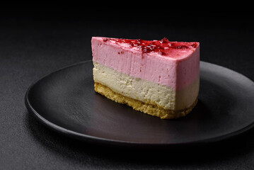 Delicious sweet dessert cheesecake with raspberry and pistachio flavor
