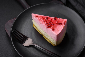 Delicious sweet dessert cheesecake with raspberry and pistachio flavor