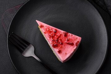 Delicious sweet dessert cheesecake with raspberry and pistachio flavor