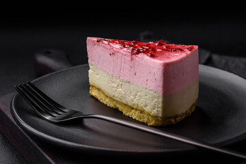 Delicious sweet dessert cheesecake with raspberry and pistachio flavor