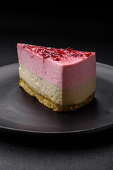 Delicious sweet dessert cheesecake with raspberry and pistachio flavor
