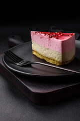 Delicious sweet dessert cheesecake with raspberry and pistachio flavor
