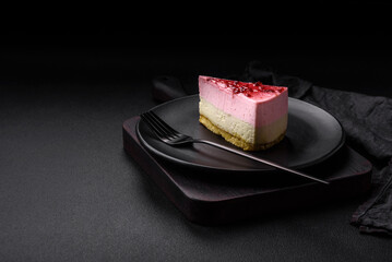 Delicious sweet dessert cheesecake with raspberry and pistachio flavor