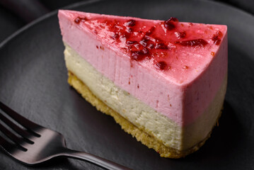 Delicious sweet dessert cheesecake with raspberry and pistachio flavor