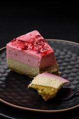 Delicious sweet dessert cheesecake with raspberry and pistachio flavor