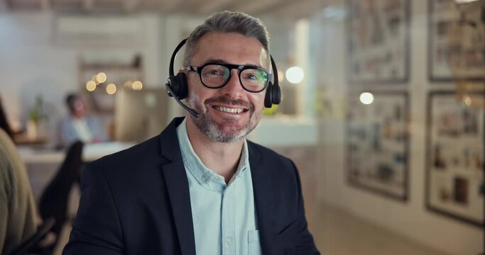 Face of callcenter agent, smile and man consulting with advice, sales or help desk worker with headset. Phone call, telecom office and happy senior customer support consultant at crm service agency.