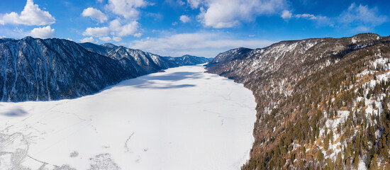 Altai mountains in winter: Teletskoye lake. Aerial view. - obrazy, fototapety, plakaty
