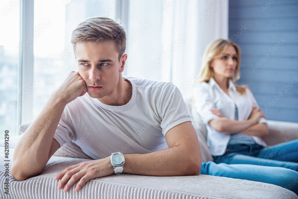 Wall mural Young couple quarrels