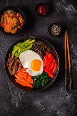 Traditional Korean dish Bibimbap: rice with vegetables beef and egg.