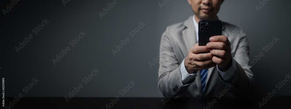 Poster a person holds a phone and is using social media apps, a businessman checks information and sends em