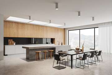 White kitchen corner with island and dining table